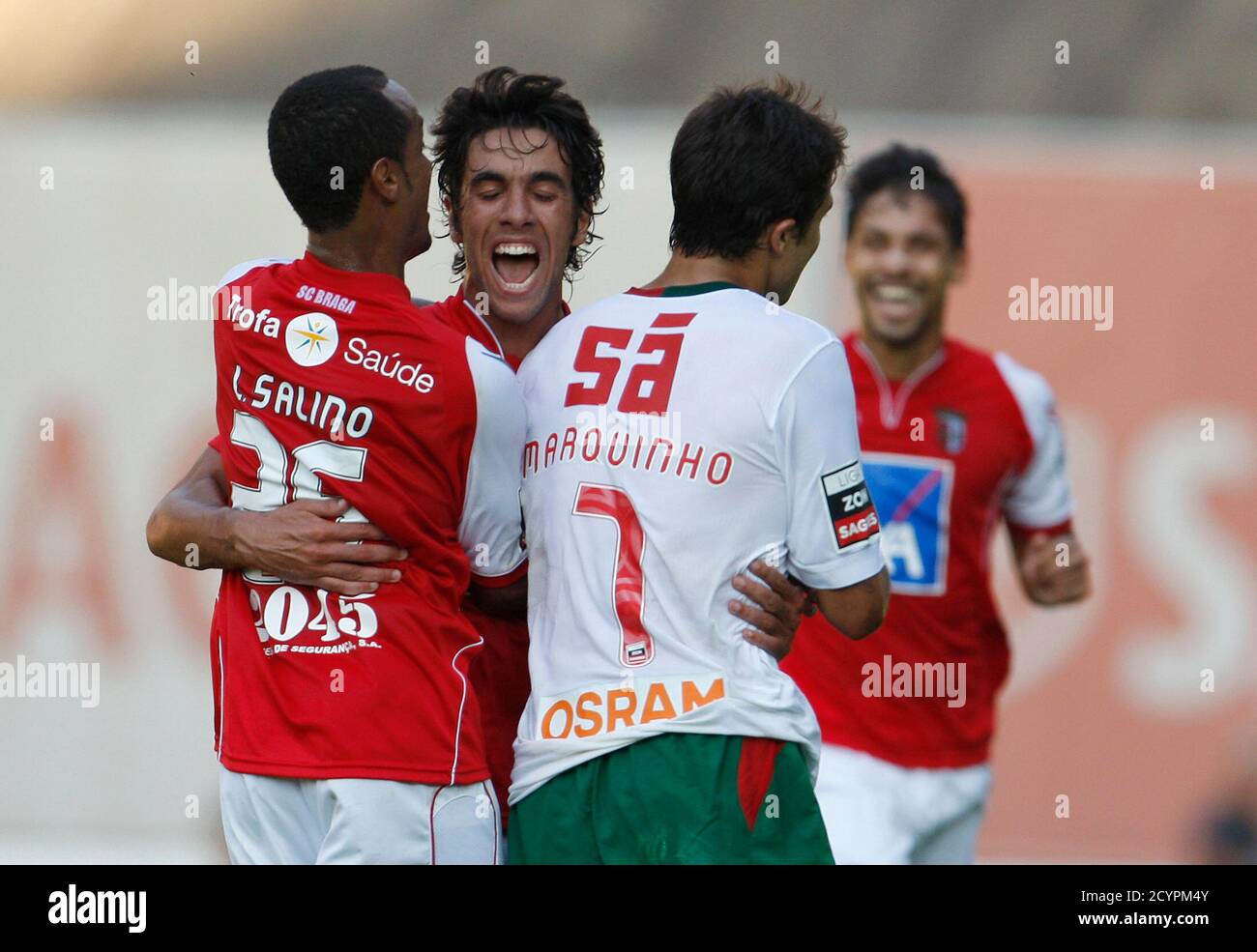 Sporting Braga S Silvio Azevedo C Celebrates His Goal With His Teammate Leandro Salino L And Maritimo S Marquinho During Their Portuguese Premier League Soccer Match Against Maritimo At Braga City Stadium August 29