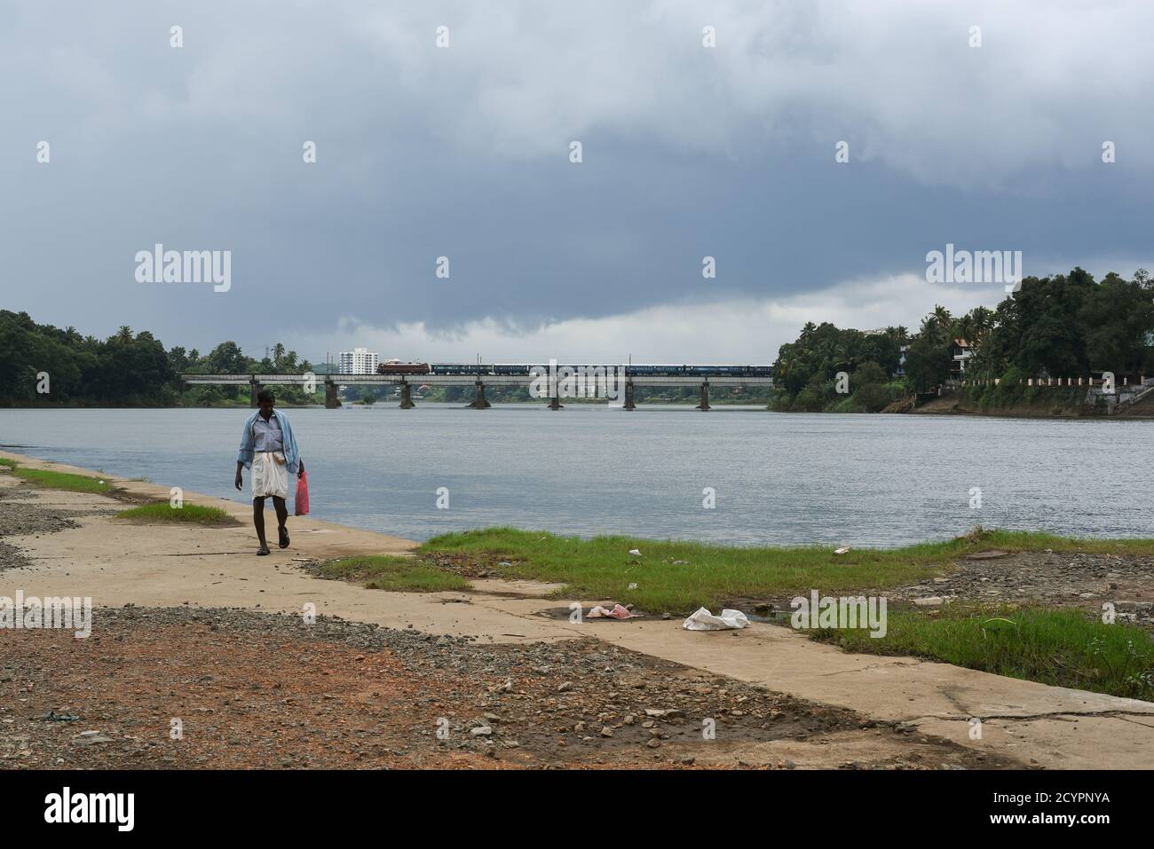 Aluva or Alwaye banks of Periyar River Kerala bridge across Periyar