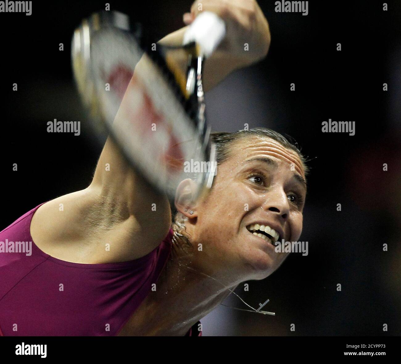Flavia Pennetta of Italy serves to CoCo Vandeweghe of the U.S.during their fourth round  tennis match of the Fed Cup final in San Diego, California November 7, 2010.   REUTERS/Mike Blake  (UNITED STATES - Tags: SPORT TENNIS) Stock Photo
