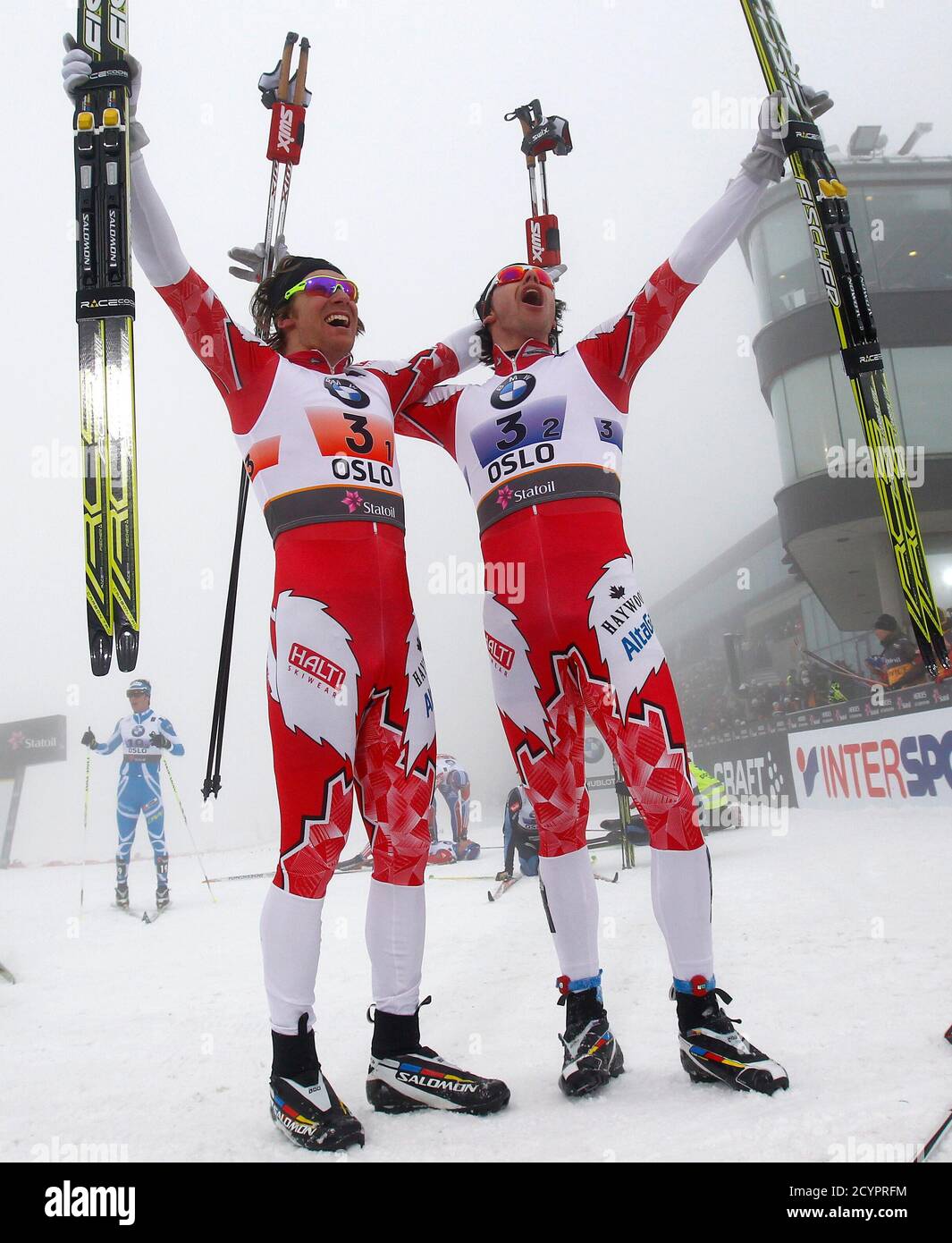 Devon Kershaw (L) and Alex Harvey of Canada celebrate after winning the  men's cross country team sprint classic event at the Nordic World Ski  Championships in Oslo March 2, 2011. REUTERS/Michael Dalder (