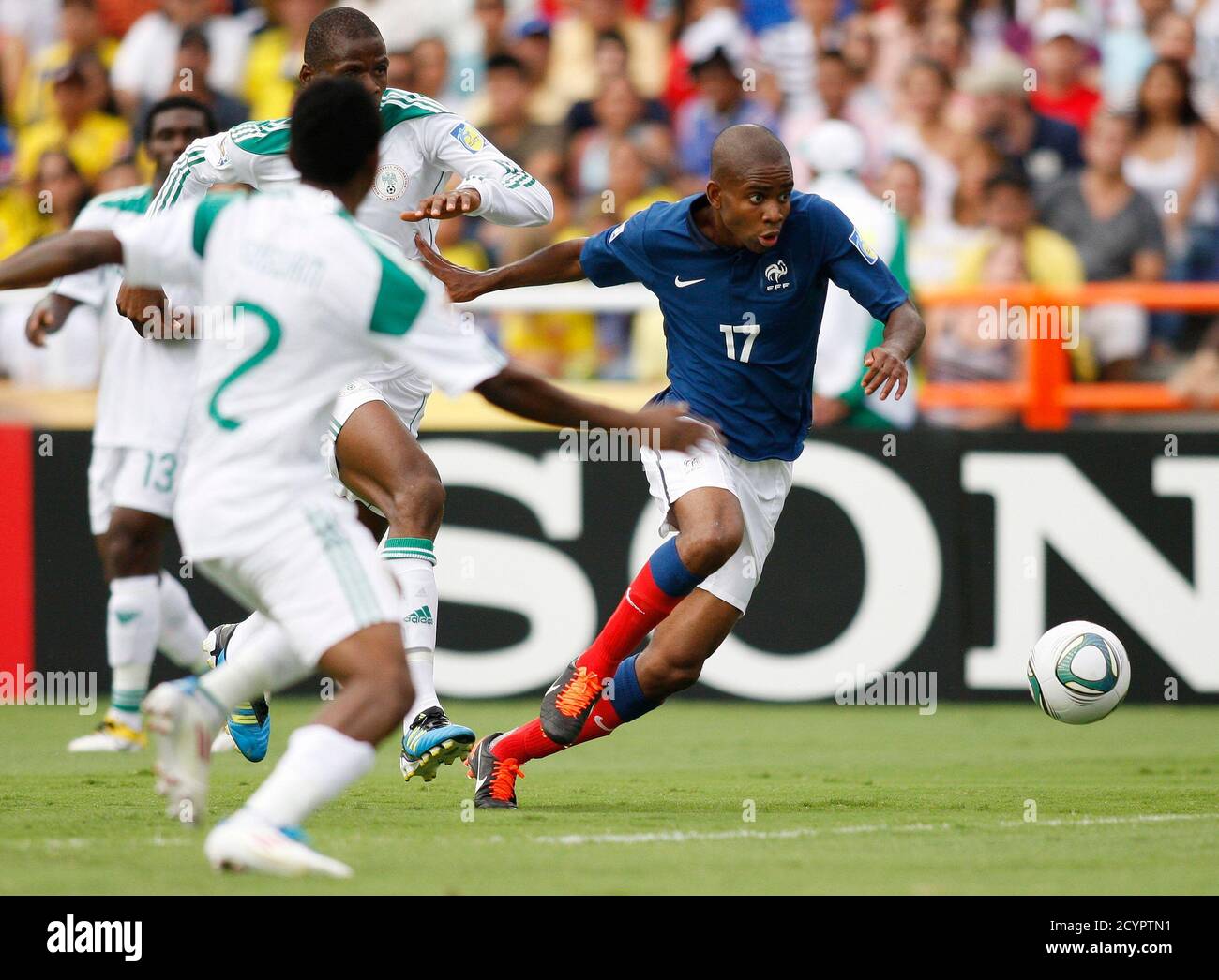 France S Cedric Bakambu R Breaks Away From Nigeria S Terna Suswan 2 And Ganiu Ogungbe During Their Fifa U 20 World Cup Quarterfinal Soccer Match In Cali August 14 2011 Reuters Jaime Saldarriaga Colombia