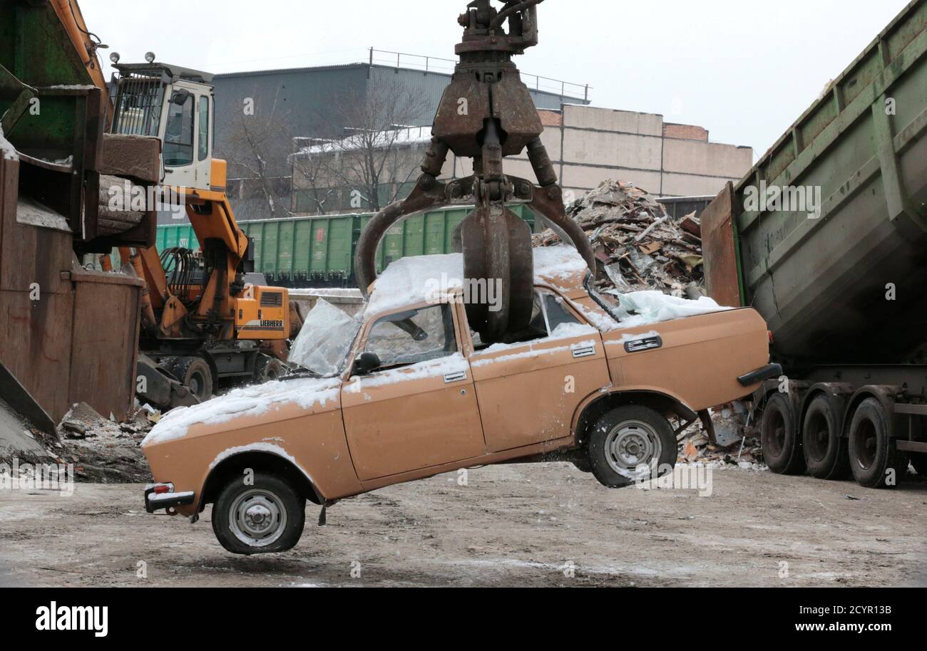 A Crane Processes A Soviet Era Moskvich Car At Vtormet Scrappage Plant Outside Moscow January 30 2013 Scrap Dealer Yuri Vorontsov Hopes Business At His Vtormet Yard Outside Moscow Will Pick Up Soon