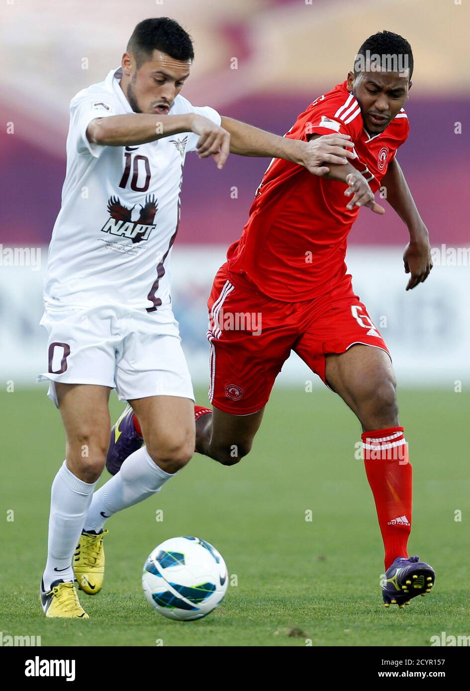 Al Arabi S Abdulaziz Hatem R Fights For The Ball With El Jaish S Karim Ziani During The Qatar Stars League In Doha February 22 13 Reuters Fadi Al Assaad Qatar s Sport Soccer Stock Photo Alamy