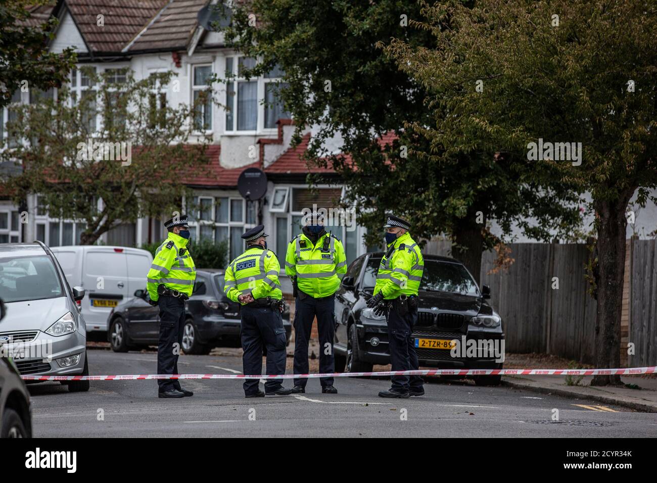 Metropolitan Police officers and Forensic officers outside the address of 23-year-old Louis De Zoysa, Norbury, South London, England, UK Stock Photo