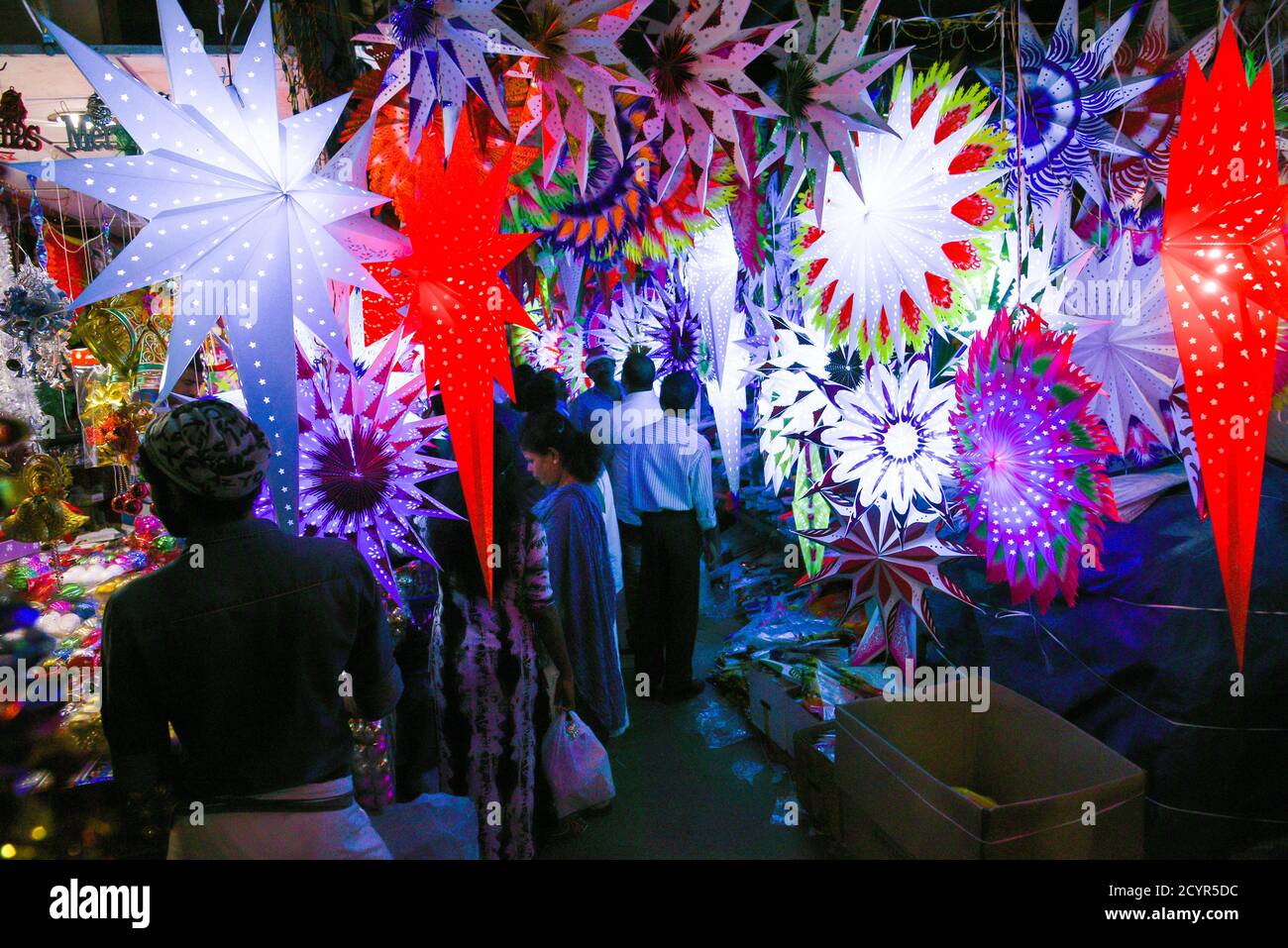 Colorful Christmas stars lighted in a Christmas market in Kerala Goa India. Indian Christmas 