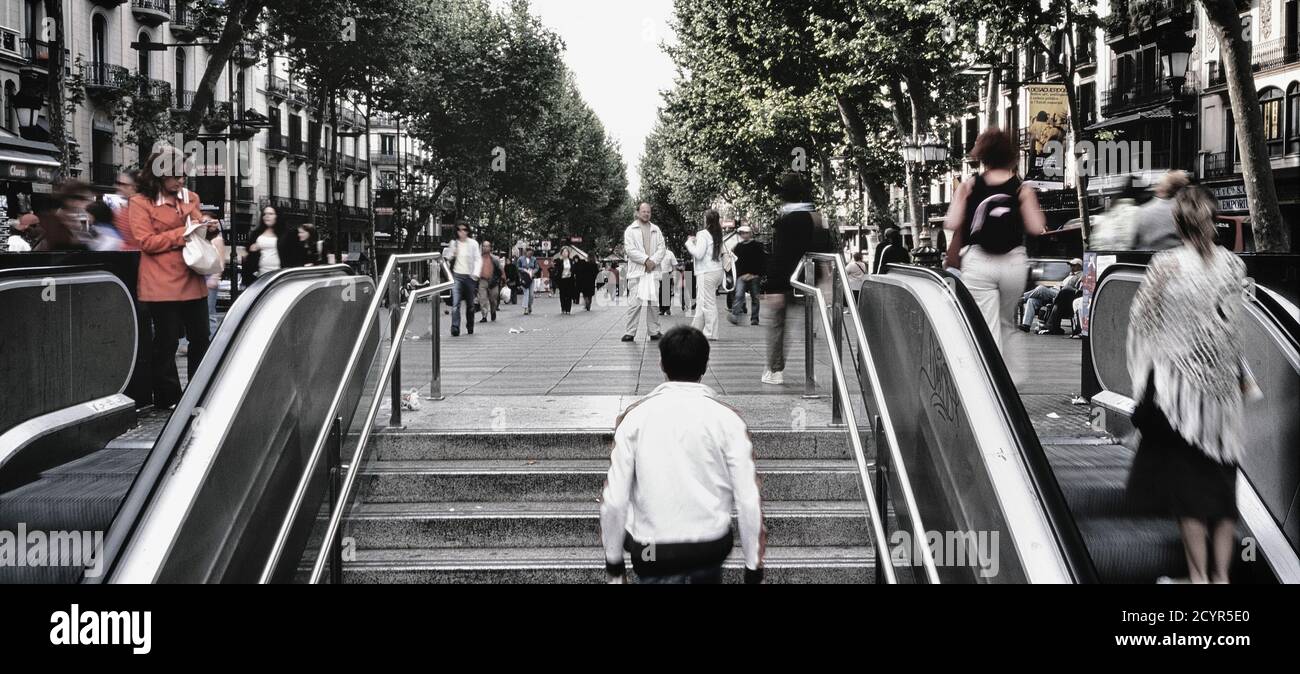 Escalators and stairs exit and entrance to Metro station at La Rambla Street in the City of Barcelona in Catalunya in Spain in Europe Stock Photo