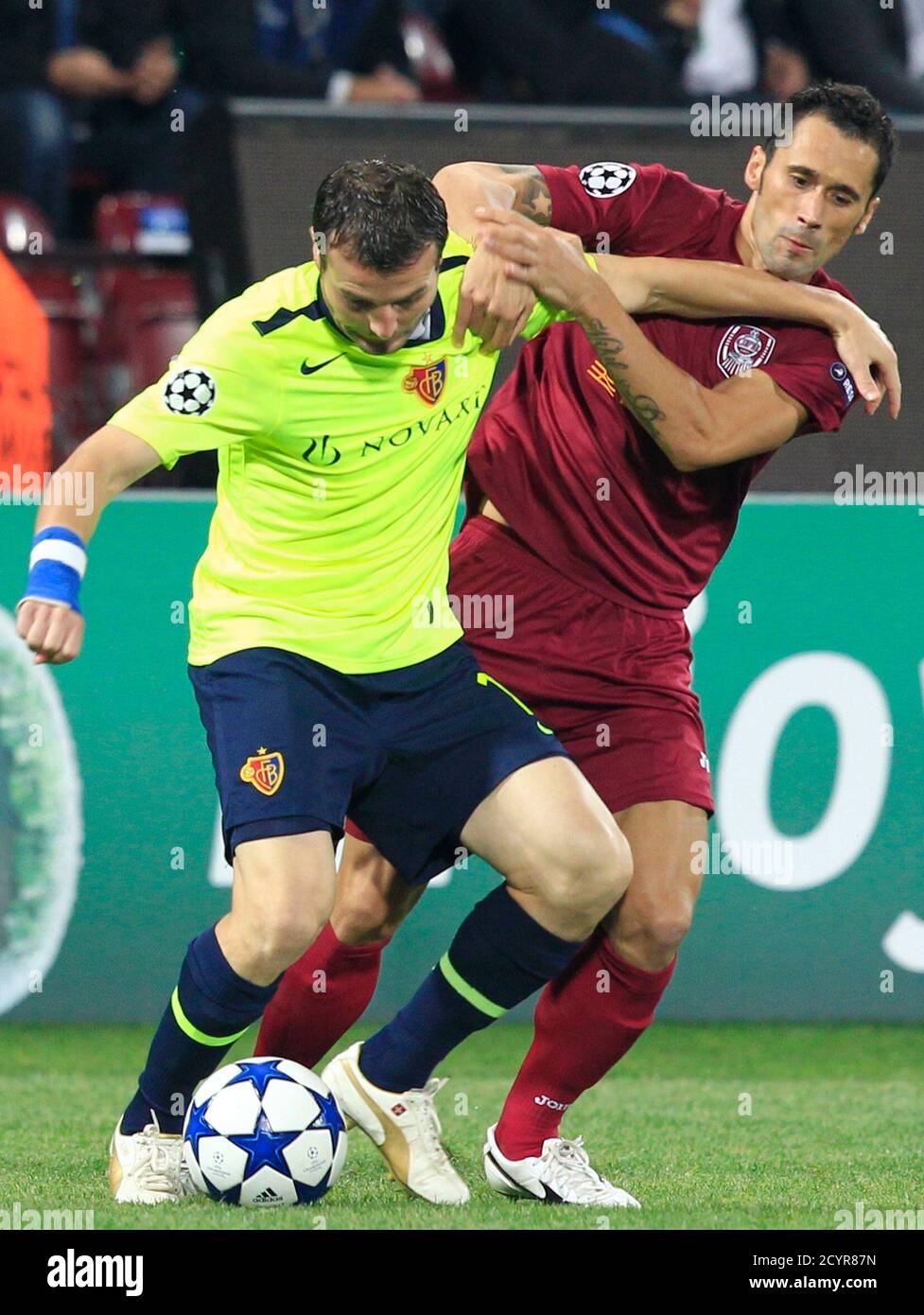 Alexander Frei L Of Fc Basel Fights For The Ball With Emil Dica Of Cfr Cluj During Their Champions League Group E Soccer Match In Cluj September 15 2010 Reuters Radu Sigheti Romania