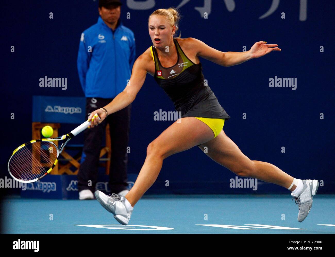 Caroline Wozniacki of Denmark returns the ball to Petra Kvitova of the  Czech Republic during their third round match at the China Open tennis  tournament in Beijing October 7, 2010. Wozniacki became