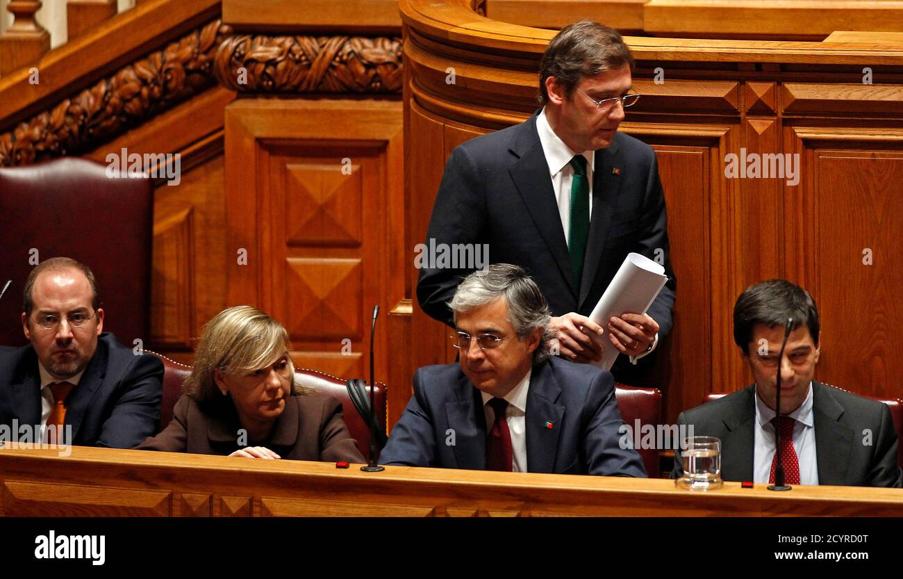 Portugal S Prime Minister Pedro Passos Coelho Walks Behind His Economy Minister Alvaro Santos Pereira Justice Minister Paula Teixeira Da Cruz Defence Minister Jose Pedro Aguiar Branco And Finance Minister Vitor Gaspar L R Portugal S Prime Minister Pedro Passos Coelho Walks Behind His Economy Minister Alvaro Santos Pereira Justice Minister Paula Teixeira Da Cruz Defence Minister Jose Pedro Aguiar Branco And Finance Minister Vitor Gaspar L R