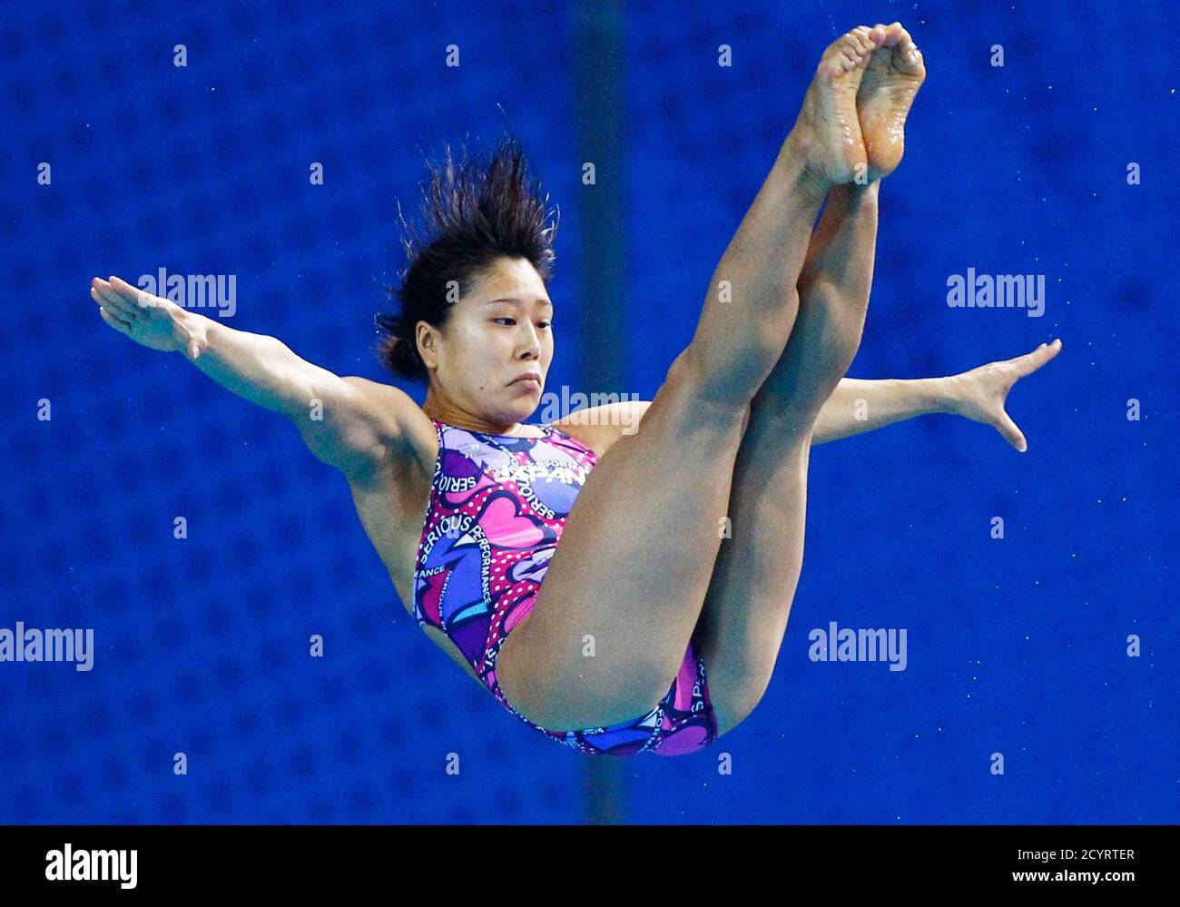 Mai Nakagawa of Japan competes in the women's 3m springboard diving final at the 16th Asian Games in Guangzhou, Guangdong province, November 26, 2010. REUTERS/Jason Lee (CHINA  - Tags: SPORT DIVING) Stock Photo