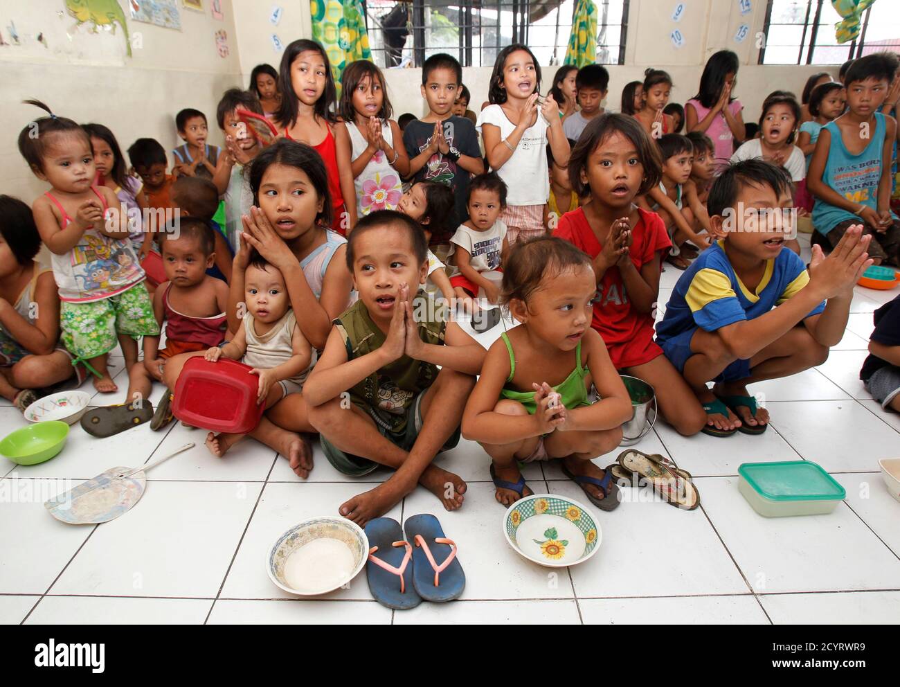Philippines feeding program hi-res stock photography and images - Alamy