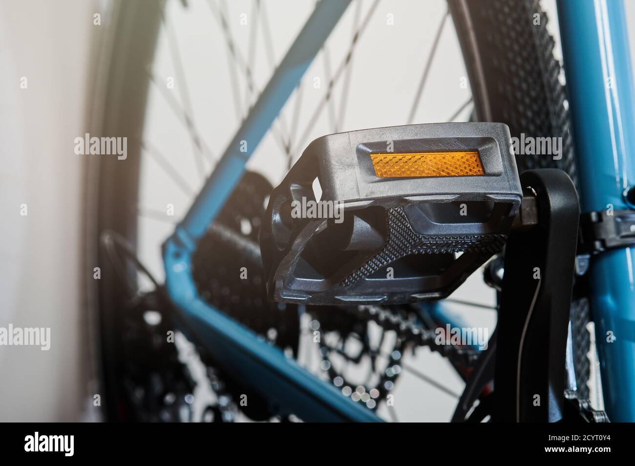 Bicycle transportation theme. Close up of black plastic pedal Stock Photo