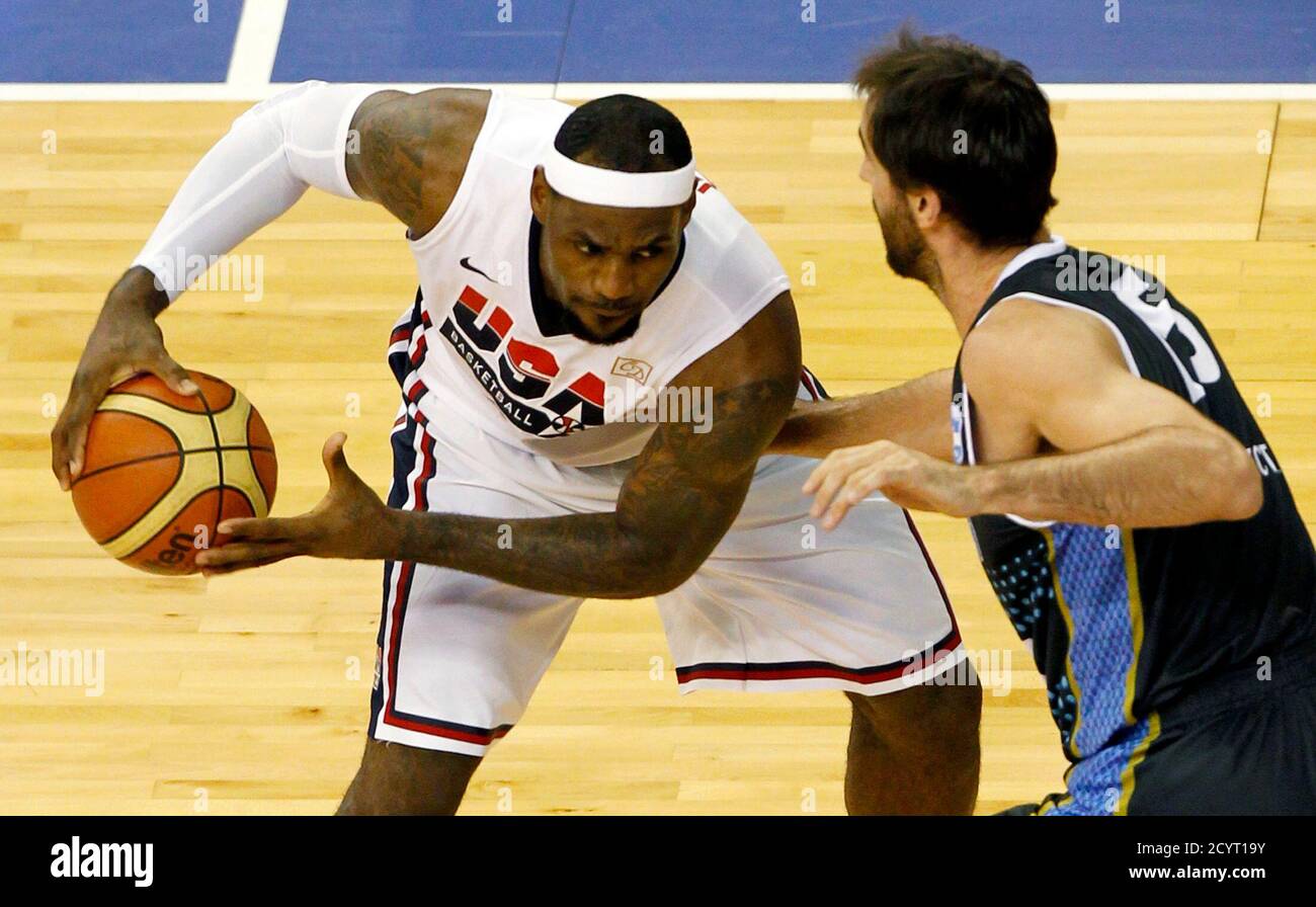 Lebron James L Of Team Usa Fights For A Ball Against Team Argentina S Federico Kammerichs During Their Men S Exhibition Basketball Game Ahead Of The London 12 Olympic Games At Palau Sant Jordi Lebron James L Of Team Usa Fights For A Ball Against Team Argentina S Federico Kammerichs During Their Men S Exhibition Basketball Game Ahead Of The London 12 Olympic Games At Palau Sant Jordi
