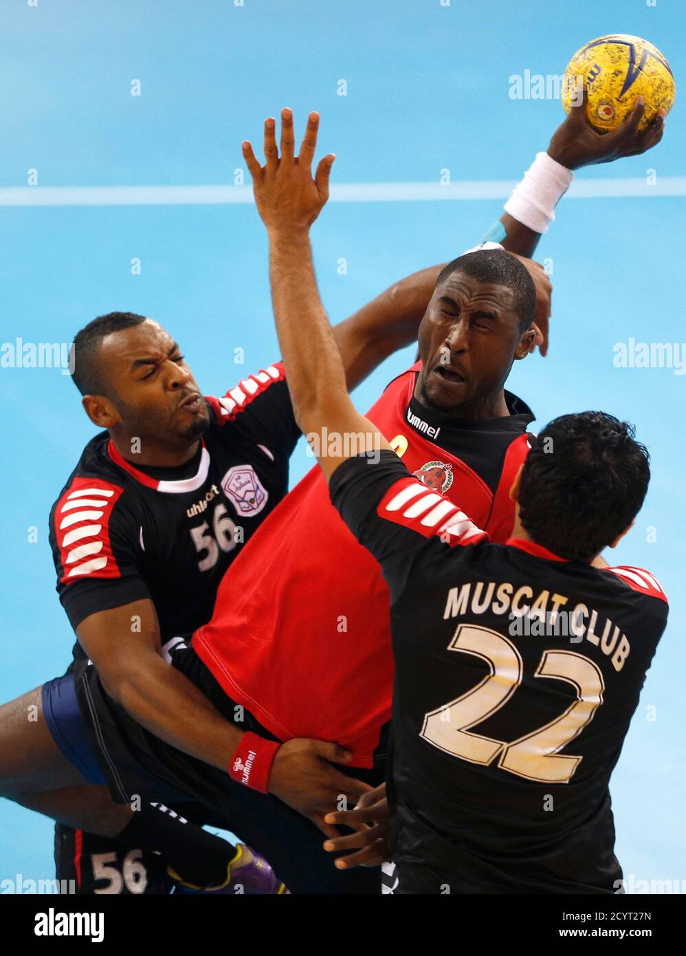 Selim Hedoui C Of Qatar S Al Rayyan Tries To Score Against Maher Al Dughaishi And Nasser Al Tamtami L Of Oman S Muscat During The Asian Handball Club Championship In Doha November 3 2012