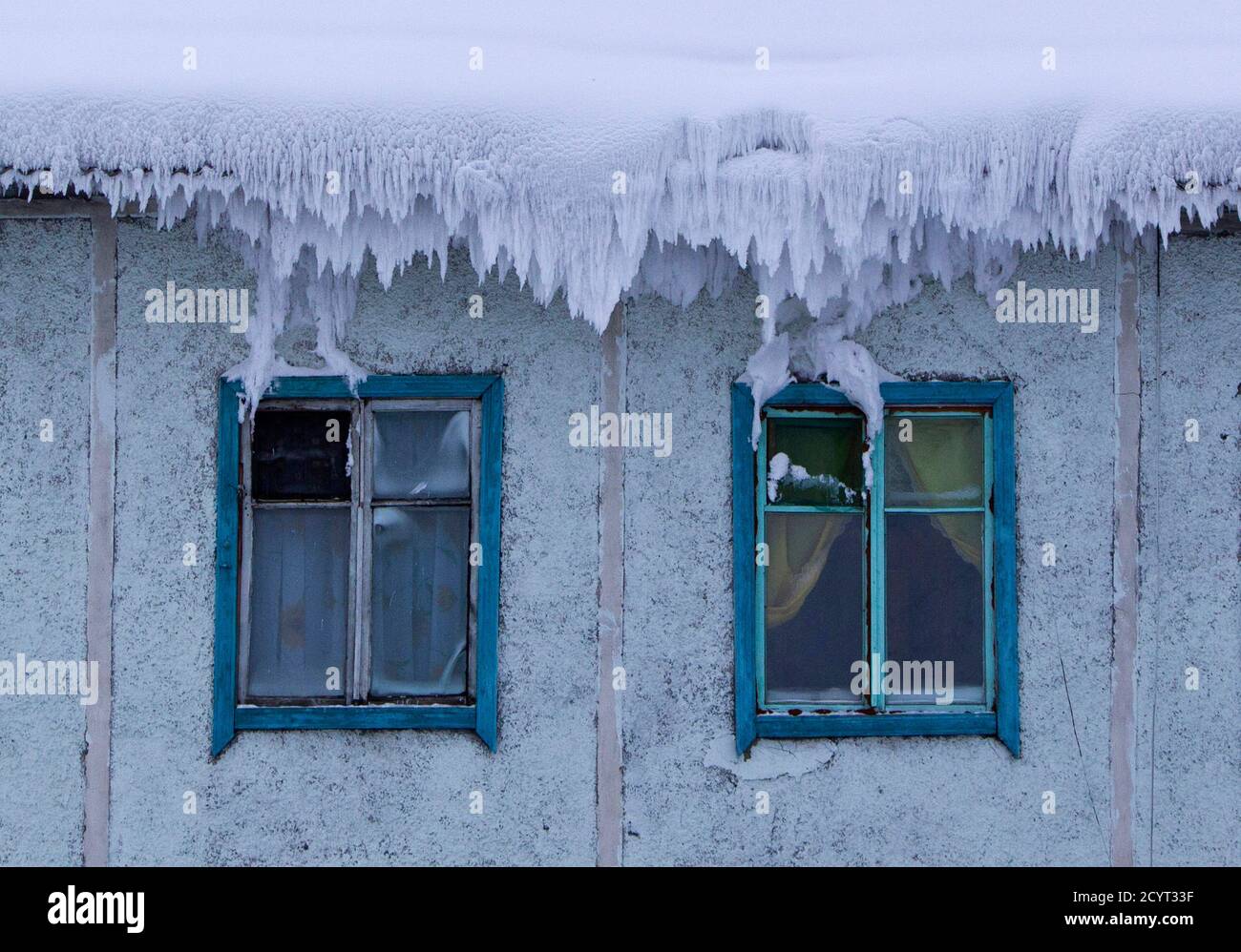 The Roof Of A House Is Covered With Snow In The Village Of Tomtor In The Oymyakon Valley In The Republic Of Sakha Northeast Russia January 24 2013 The Coldest Temperatures In