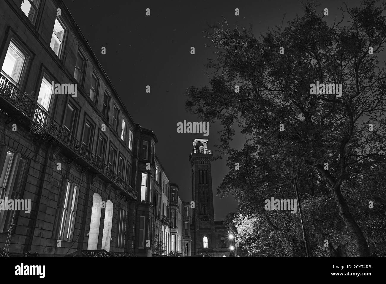 Looking down Woodlands Terrace to Trinity Towers by the light of an Autumn / Fall full moon. Glasgow, Scotland. Stock Photo