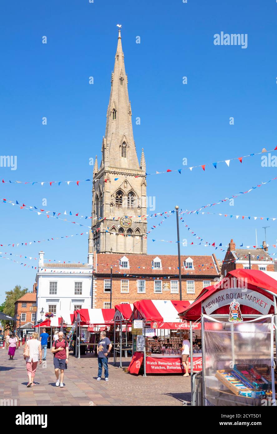 Newark market and Church of St. Mary Magadalene behind the Newark Royal market in the Market Place Newark-on-Trent Nottinghamshire UK GB Europe Stock Photo