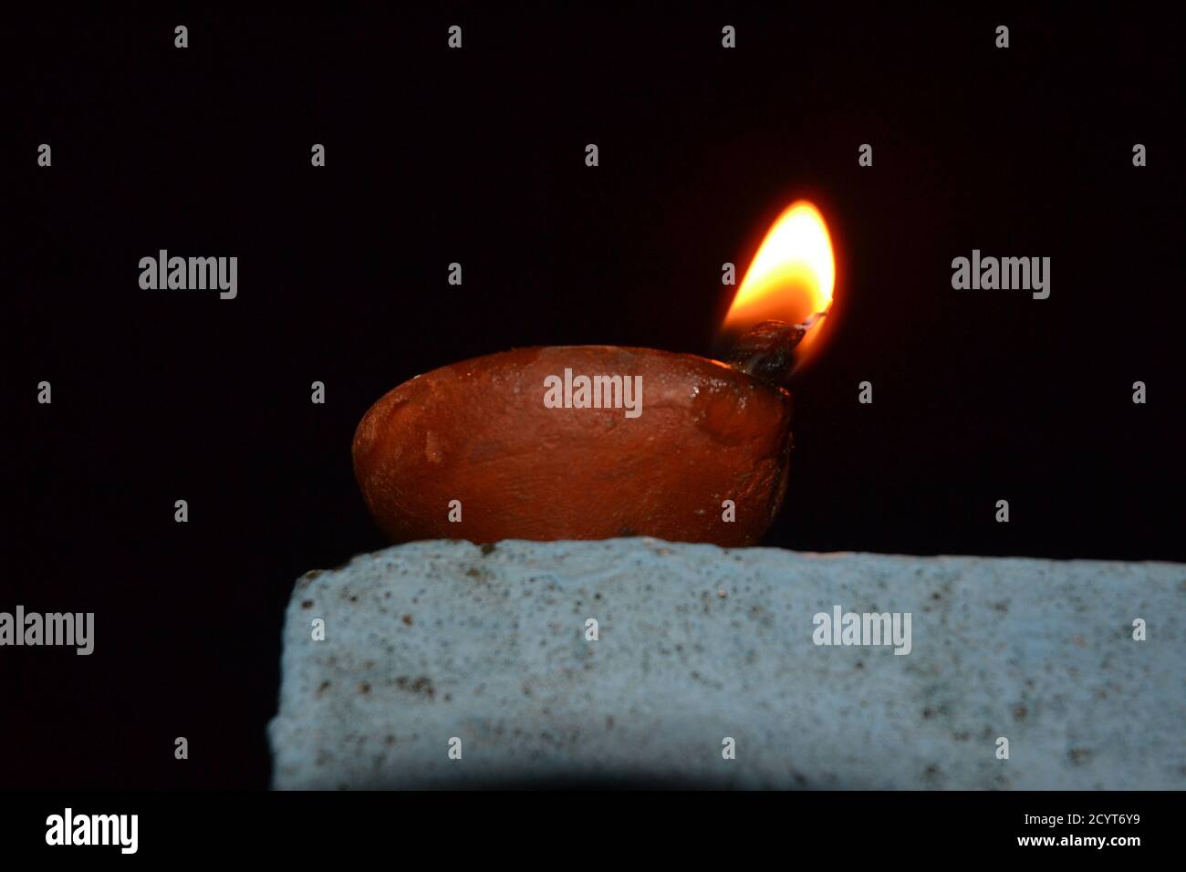 Oil lamps with flame. deepawali or diwali is celebrated by hindus by lighting the oil lamps. Stock Photo