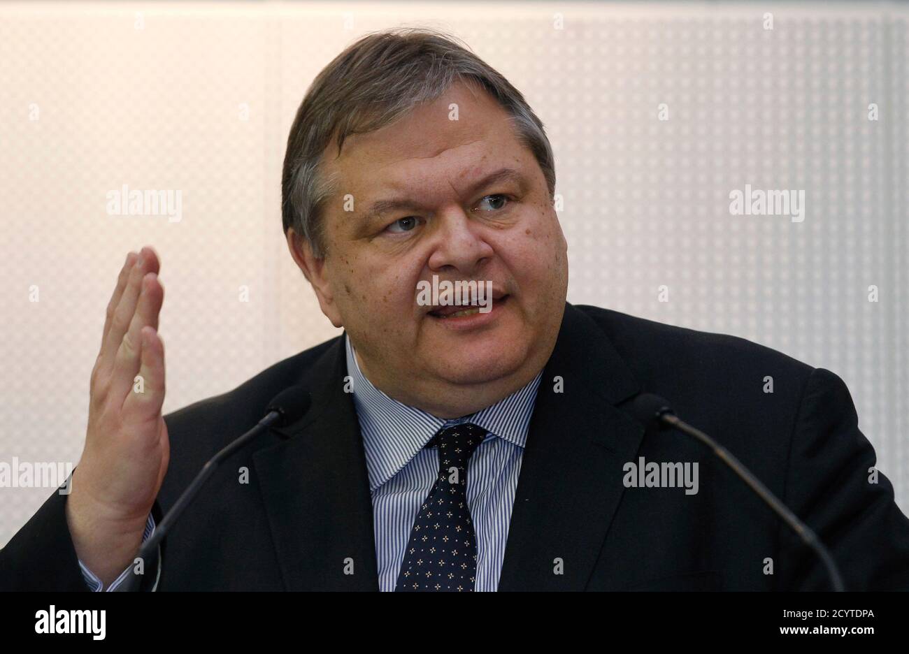 Greece's Finance Minister Evangelos Venizelos addresses the audience during a conference in Athens December 20, 2011. Talks between authorities and banks over a deal to restructure private sector holdings of Greek bonds were getting nearer to a deal, Venizelos said on Tuesday.  REUTERS/Yiorgos Karahalis (GREECE - Tags: BUSINESS POLITICS) Stock Photo