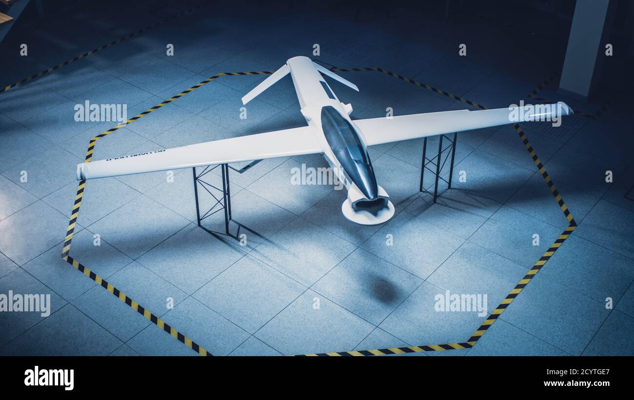 Elevated Shot of an Unmanned Aerial Vehicle Drone Prototype. Industrial Facility with Aircraft Capable of GPS Surveillance and Military Missions Stock Photo