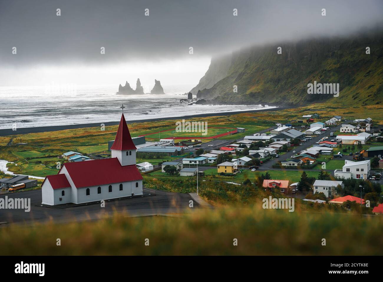Heavy clouds over the village of Vik i Myrdal in Iceland Stock Photo