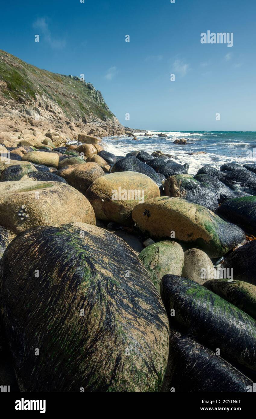 Boulders at Porth Nanven (also known as Cot Valley Beach) near St Just in Cornwall, England, UK Stock Photo
