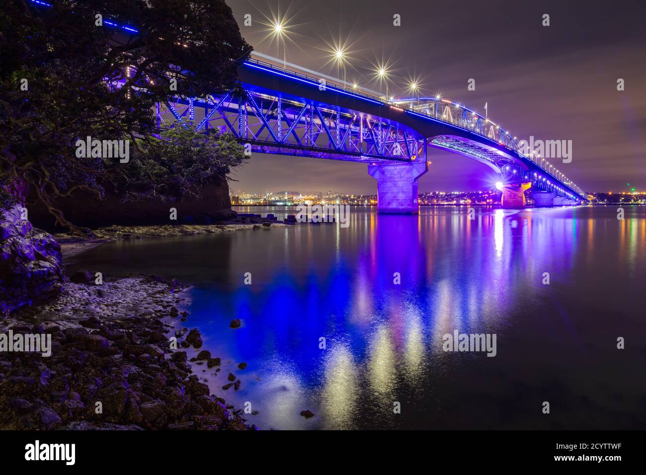 The Auckland Harbour Bridge, Auckland, New Zealand, colorfully lit up