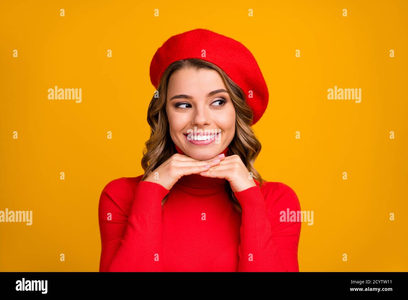 Close-up portrait of her she nice-looking attractive lovely cute winsome curious cheery wavy-haired girl touching chin overthinking isolated on bright Stock Photo