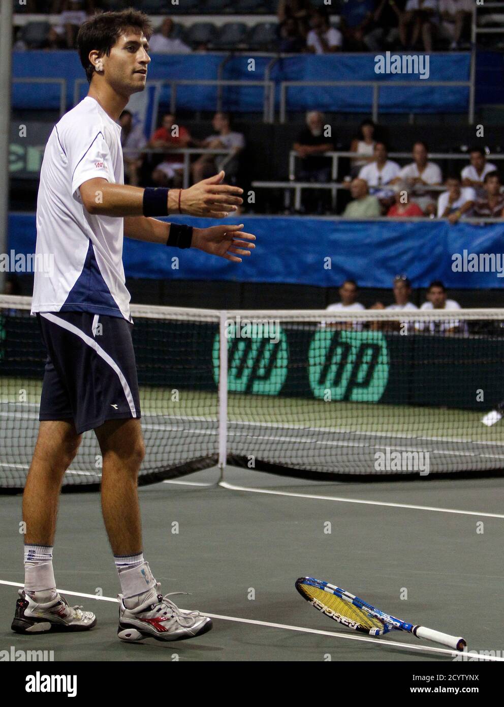 Israel's Amir Weintraub reacts during his Davis Cup World Group first round  tennis match against Canada's Milos Raonic in the city of Ramat Hasharon  near Tel Aviv September 16, 2011. REUTERS/Nir Elias (