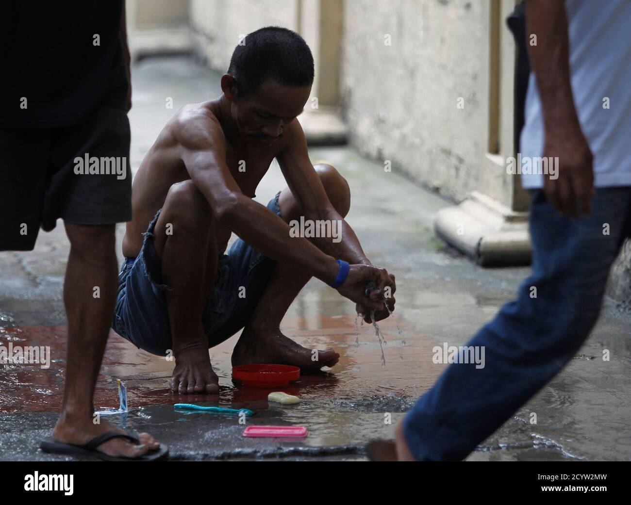 Homeless man taking a bath hires stock photography and images Alamy
