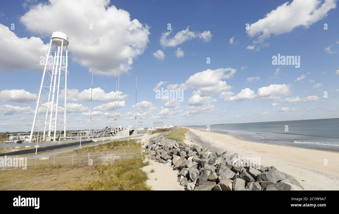 A seawall protects the launch pad at the NASA Wallops Flight Facility in Virginia October 24, 2013. The island, which serves as a launchpad for scientific voyages to collect data on the changes to the Earth, is under threat from sea level rise. Picture taken October 24, 2013. To match Special Report SEALEVEL-FLOODING/CHESAPEAKE   REUTERS/Kevin Lamarque  (UNITED STATES - Tags: ENVIRONMENT SCIENCE TECHNOLOGY) Stock Photo