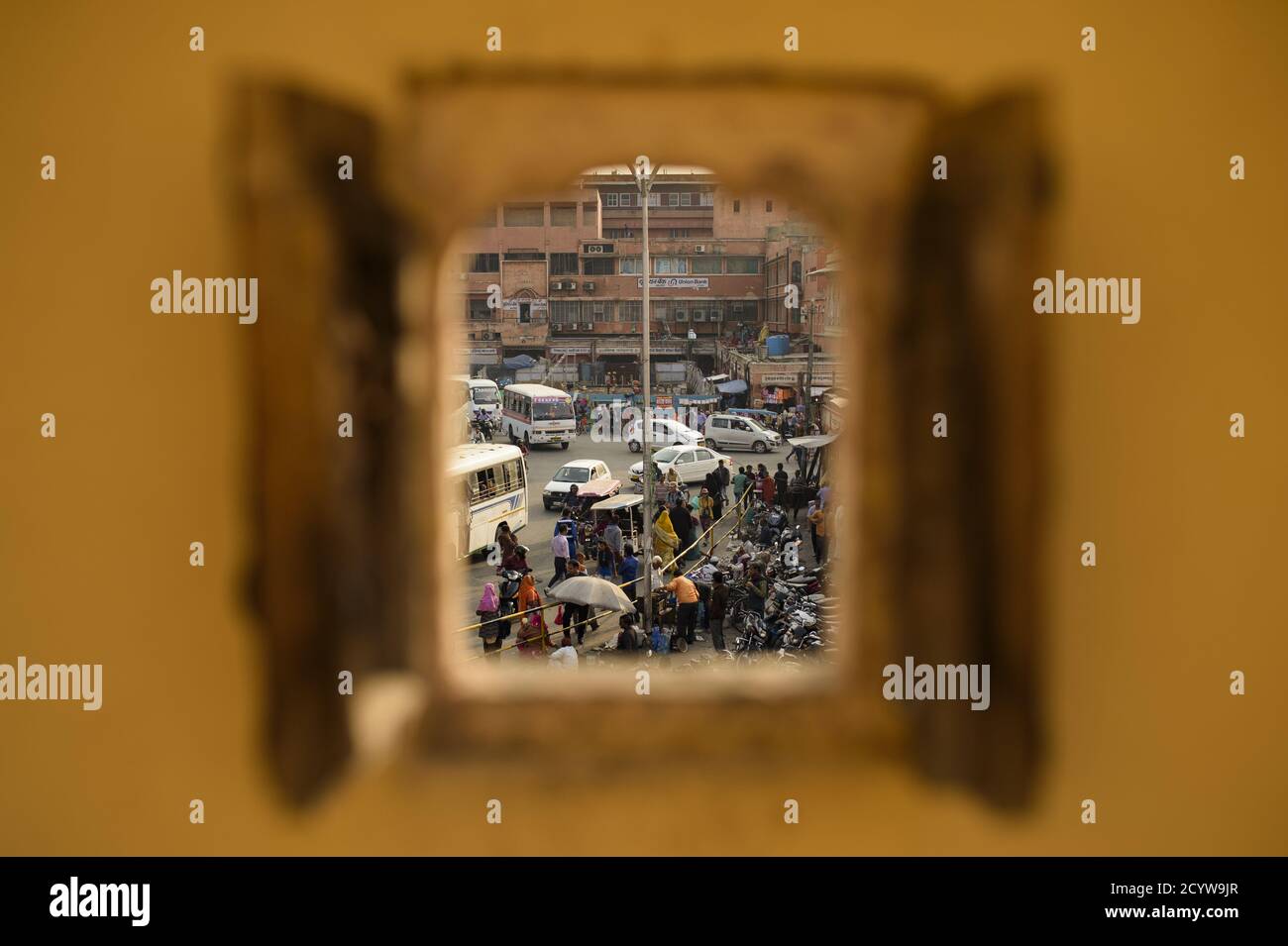 (Selective focus) View through the window, City life through the streets of Jaipur during the Covid-19 outbreak. Stock Photo