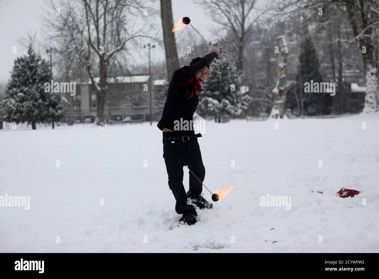 Keenan Pischke Practices Fire Poi In Kirkland Washington January 18 12 Seattle Area Residents On Tuesday Braced For An Epic Storm Expected To Drop Up To 10 Inches Of Snow And Nicknamed
