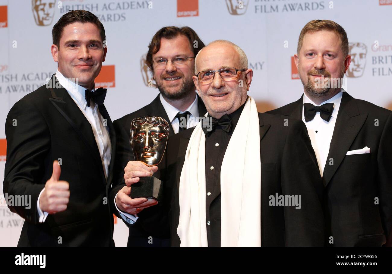 Tim Burke (L-R), John Richardson, Greg Butler and David Vickery hold the  award for Special Visual Effects for Harry Potter and the Deathly Hallows:  Part 2, at the British Academy of Film