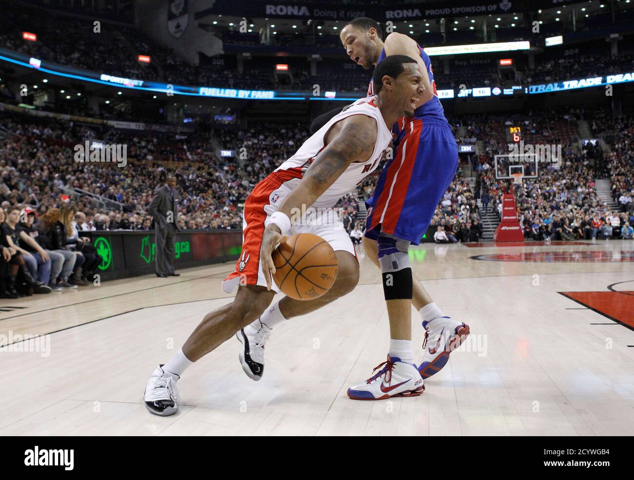 Toronto Raptors' James Johnson goes to the basket against Detroit Pistons'  Tayshaun Prince (R) during the first half of their NBA basketball game in  Toronto, February 22, 2012. REUTERS/Mark Blinch (CANADA -