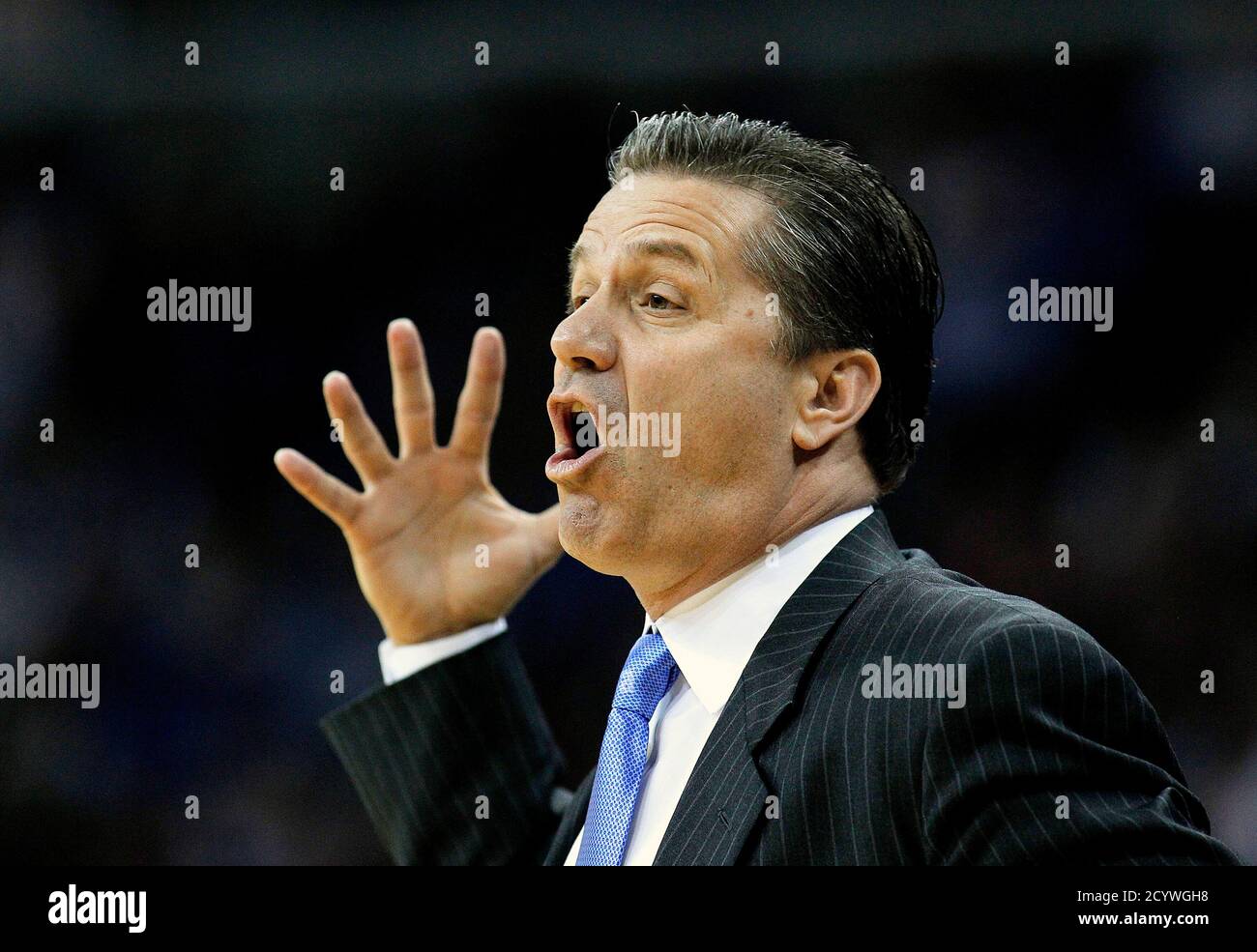 Kentucky Wildcats head coach John Calipari instructs his team as they take on the Vanderbilt Commodores during the finals of the SEC men's NCAA basketball tournament in New Orleans, Louisiana March 11, 2012. REUTERS/Jonathan Bachman (UNITED STATES - Tags: SPORT BASKETBALL) Stock Photo
