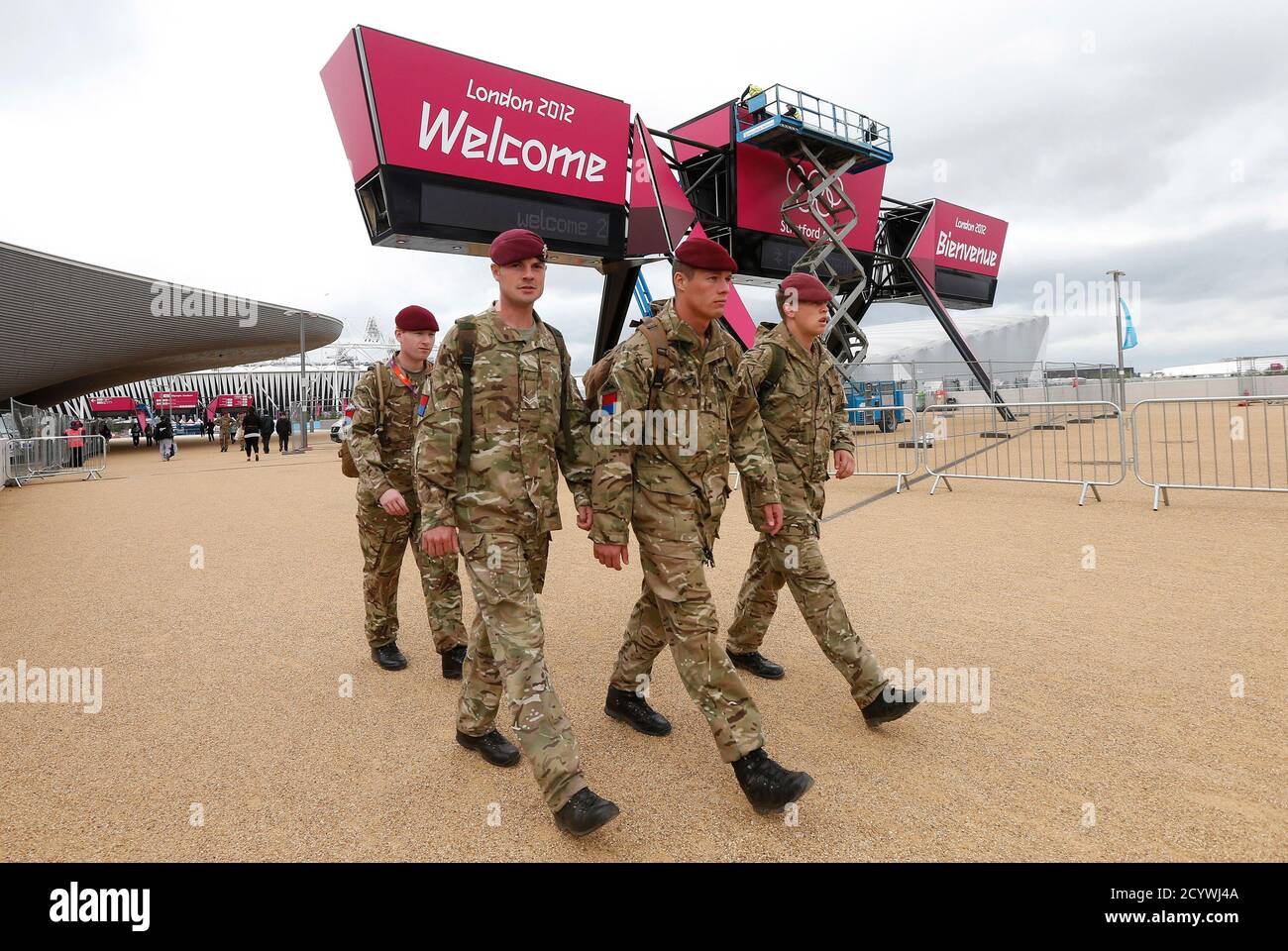 2022 Commonwealth Games | Birmingham, England | 28 July - 8 August - Page 2 Soldiers-walk-past-a-welcome-sign-at-the-olympic-park-in-stratford-the-location-of-the-london-2012-olympic-games-in-east-london-july-18-2012-britain-may-have-to-call-up-yet-more-soldiers-to-police-the-olympic-games-the-government-said-on-wednesday-after-a-failed-private-sector-recruitment-drive-left-an-embarrassing-hole-in-security-and-dashed-londons-dreams-of-a-spotless-showcase-reuterssuzanne-plunkett-britain-tags-sport-olympics-military-tpx-images-of-the-day-2CYWJ4A