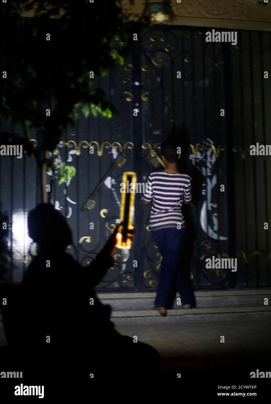Om Hani A 58 Year Old Guard Holds An Emergency Light As Her Son Opens A Door During A Power Outage In Cairo July 14 2014 The Ministry Of Electricity Has Formed A quick online length calculator to convert centimeters(cm) to feet(ft).