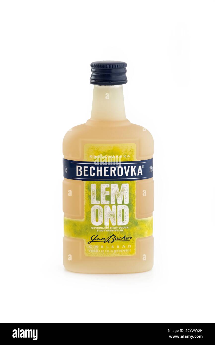 Small bottle of Becherovka,  a herbal bitters, often drunk as a digestive aid, produced in Karlovy Vary, Czech Republic by Jan Becher company. Stock Photo