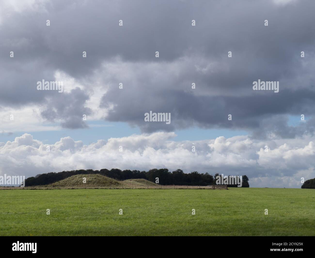 Bronze Age burial mounds aka barrows near Stonehenge, Wiltshire, England. Stock Photo