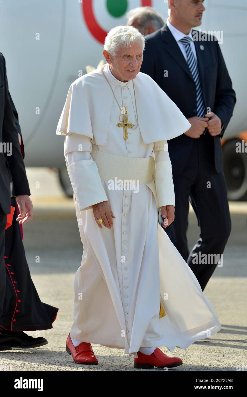 Pope Benedict XVI leaves a plane upon arrival at Linate airport in Milan  June 1, 2012.