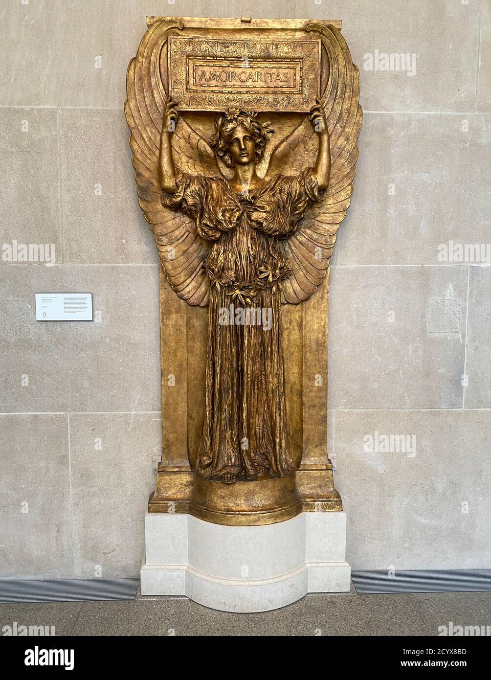 'Amor Caritas, Augustus Saint-Gaudens, Gilt Bronze, Cast 1918. Metropolitan Museum of Art; American Wing. Stock Photo