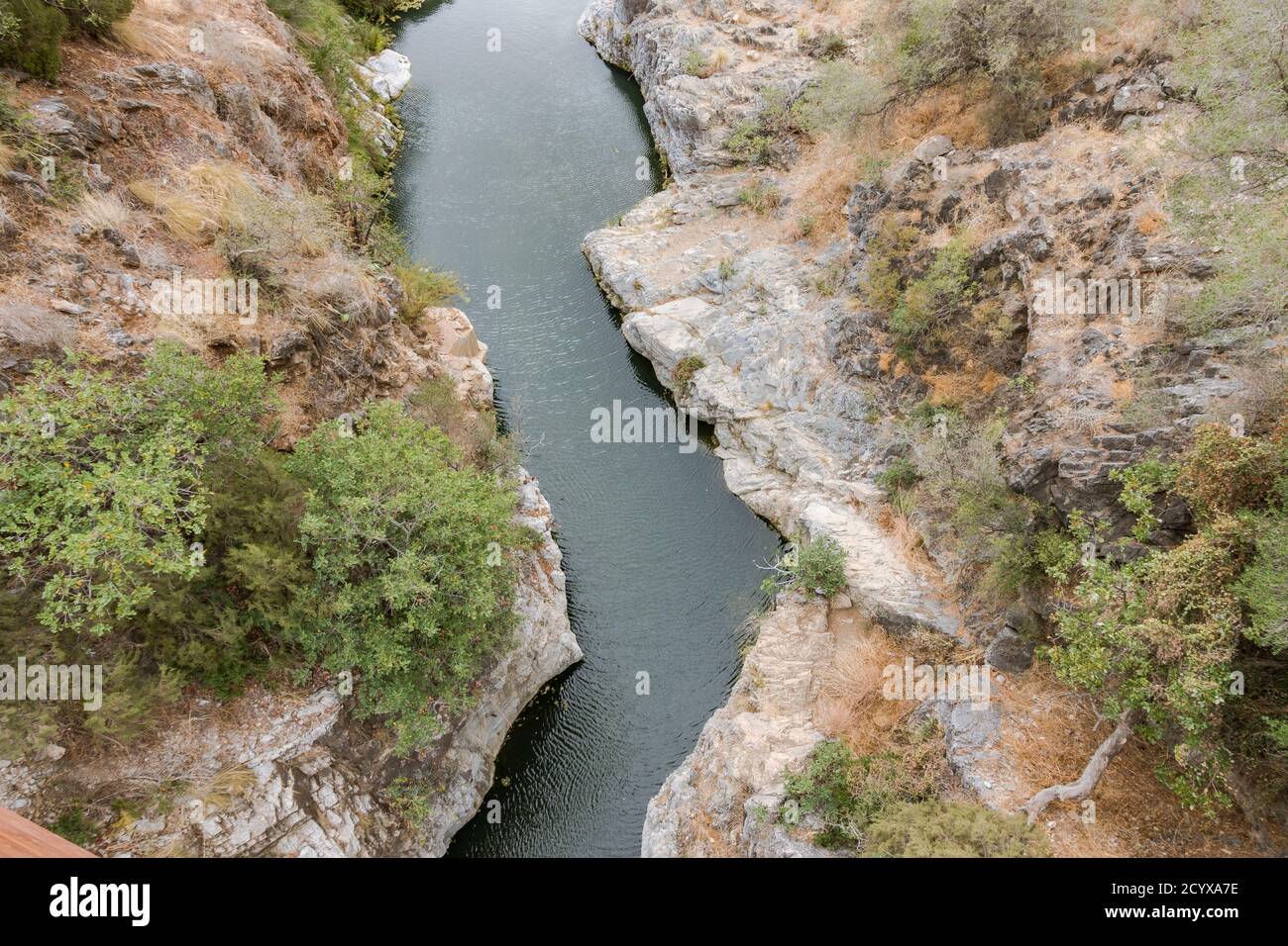 Guadalmina river at making its way through rock area, The watercourse trail (Acequia) near, Benahavis, Andalucia, Spain. Stock Photo