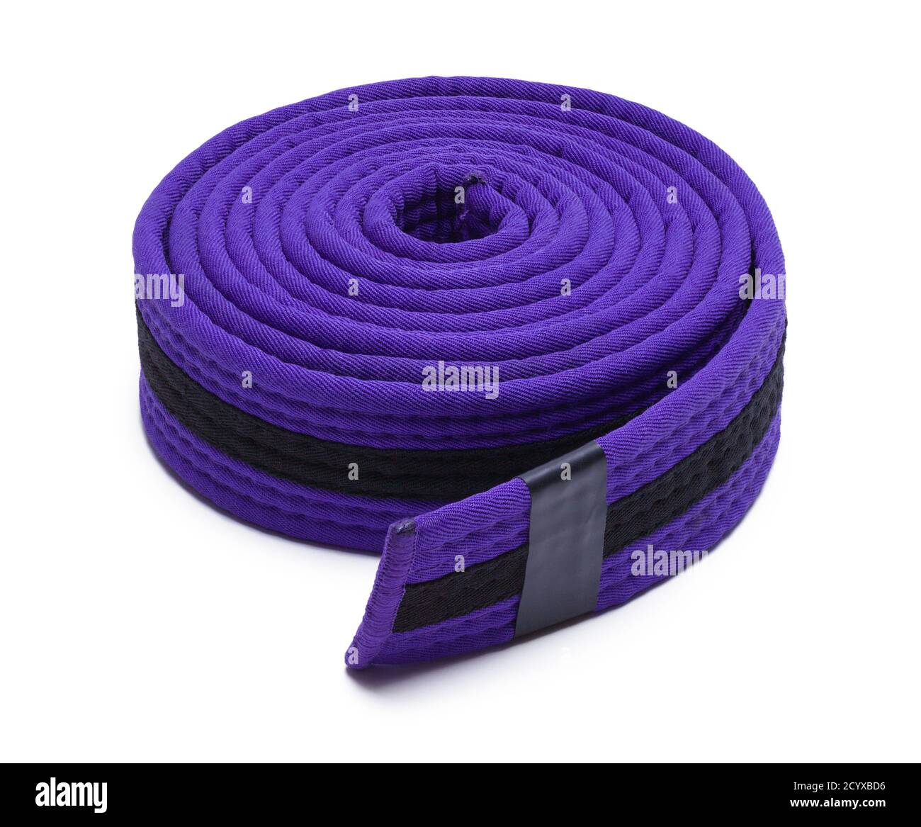 Purple Rolled Karate Belt Isolated on White. Stock Photo