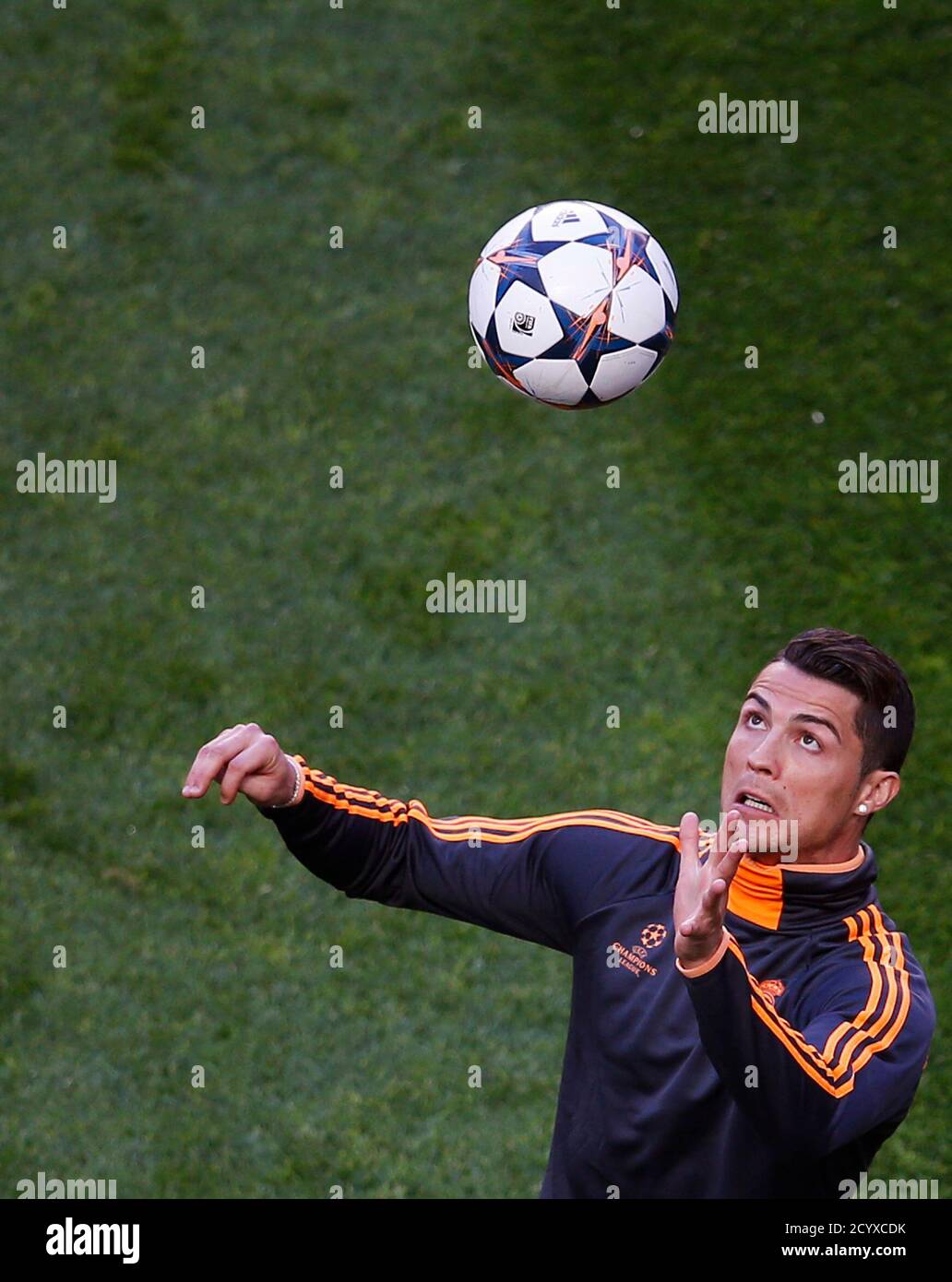 Real Madrid's Cristiano Ronaldo prepares to head a ball during a training  session ahead of the Champions League soccer final at Luz stadium in Lisbon  May 23, 2014. Real Madrid will face