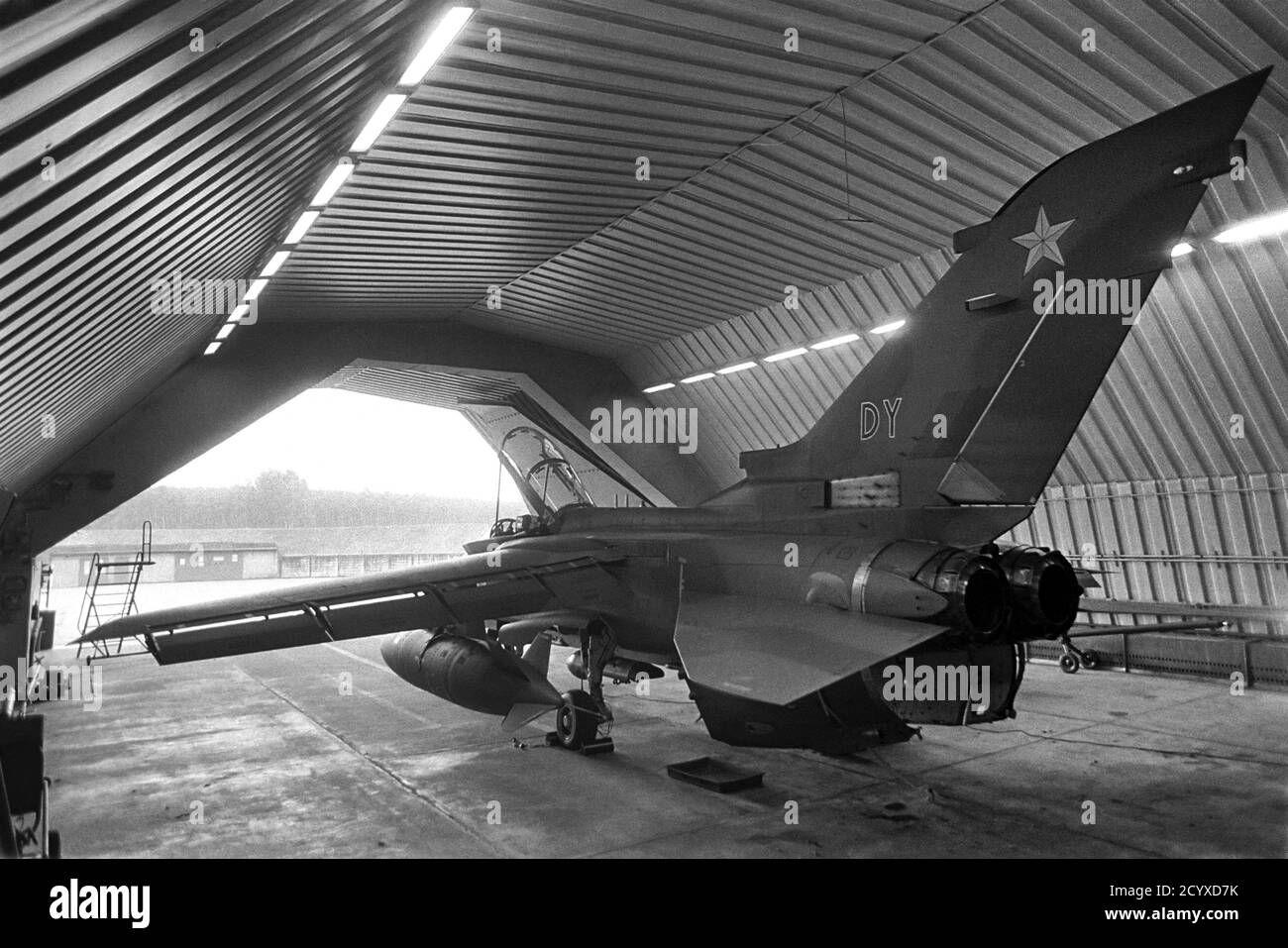 NATO in Germany, British Tornado strike aircraft in its armored shelter at RAF Bruggen air base (September 1984) Stock Photo