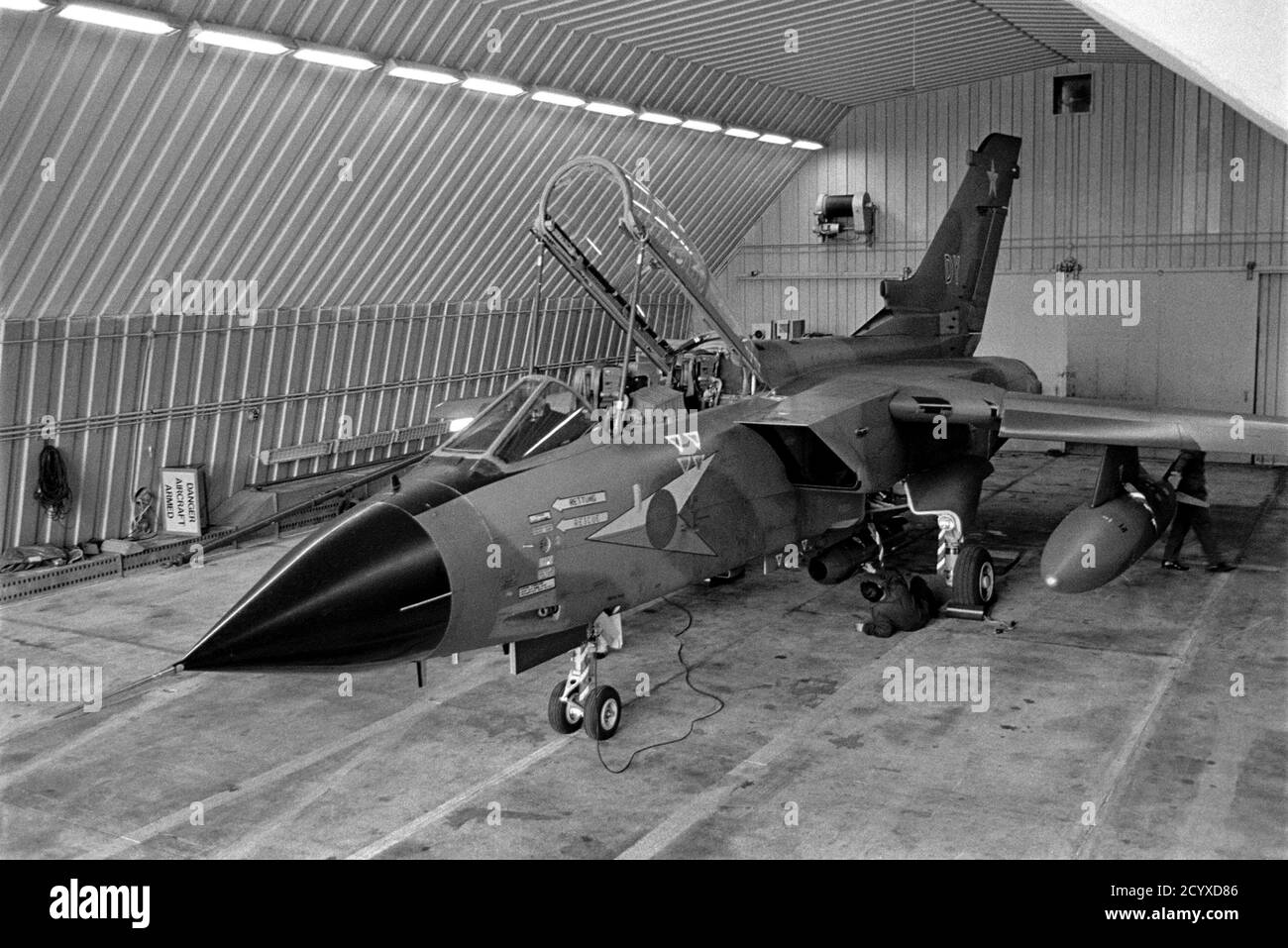 NATO in Germany, British Tornado strike aircraft in its armored shelter at RAF Bruggen air base (September 1984) Stock Photo