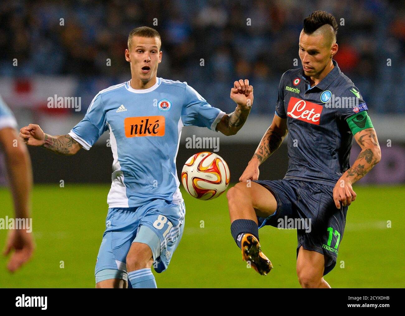 Richard Lasik L Of Slovan Bratislava Fights For The Ball With Marek Hamsik Of Napoli During Their Europa League Group I Soccer Match At The Arena Pasienky In Bratislava October 2 2014