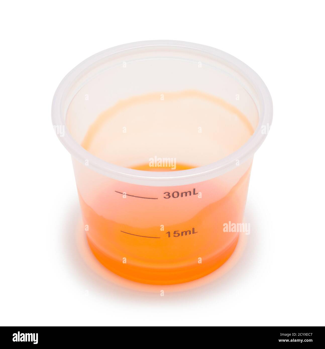 Medicine Cup with Residue Isolated on White. Stock Photo