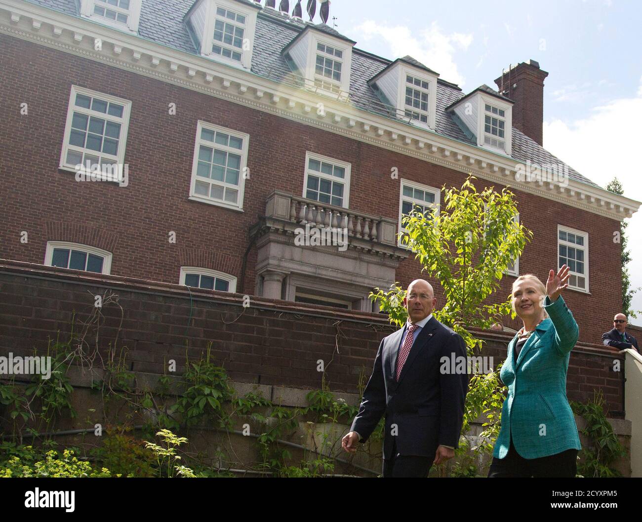 U S Secretary Of State Hillary Clinton R Walks With The U S Ambassador To Finland Bruce Oreck June 27 2012 Before Speaking During An Event Highlighting The Climate And Clean Air Coalition And
